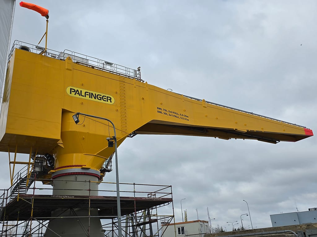 yellow offshore crane in progress electric
